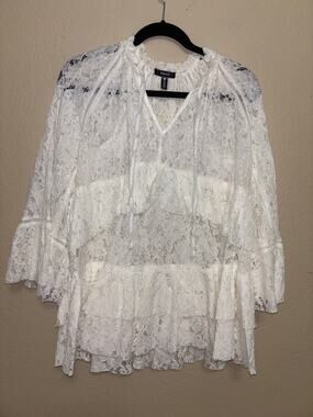 This is an AQUA white lace boho blouse/tunic